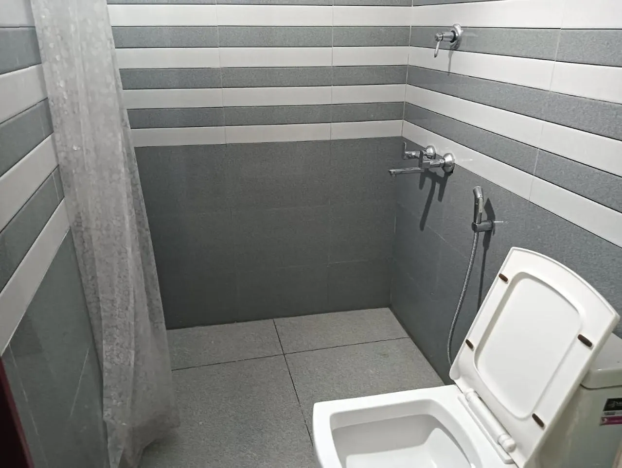 Gasthof Krk Rooms Kottārakara Indien